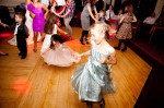 Girls dancing at a wedding in the Sand Banks Hotel wedding photography by Jonathan Lappin